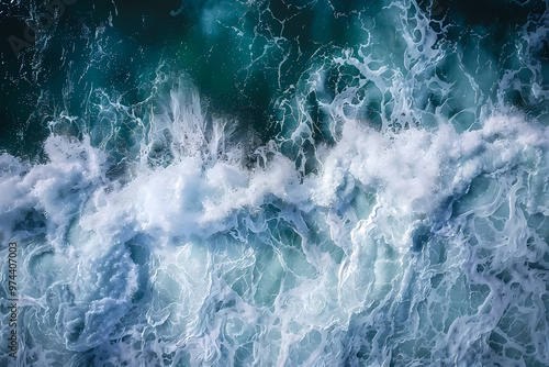 Spectacular aerial top view background photo of ocean sea water white wave splashing in the deep sea. Drone photo backdrop of sea wave in bird eye waves.