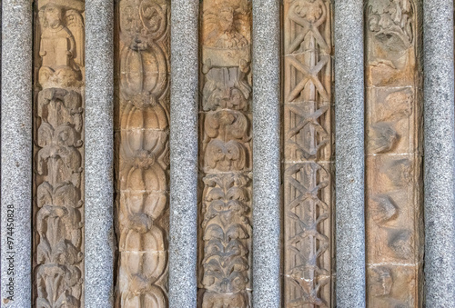 Intricate Stone Carvings Architectural Detail Cultural Heritage Preservation. Decoration next to the entrance to the St. Procopius Basilica in Trebici photo