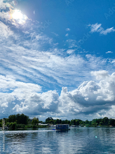 A boat floating on a lake on a good day photo