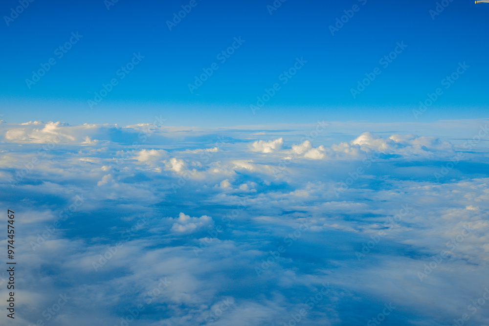 China Shanghai - Sunrise above the clouds from the plane China Shanghai - Sunrise above the clouds from the plane