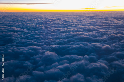 China Shanghai - Sunrise above the clouds from the plane photo