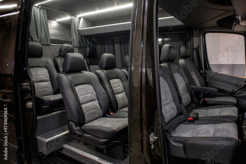 Comfortable interior of a passenger bus with soft seats. The design is made to order. Private covering of cars. Various elements of the bus interior.