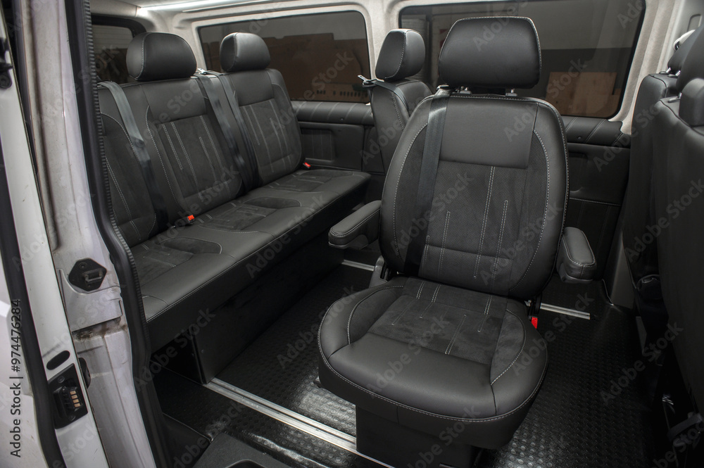 Comfortable interior of a passenger bus with soft seats. The design is made to order. Private covering of cars. Various elements of the bus interior. Comfortable interior of a passenger bus with soft seats. The design is made to order. Private covering of cars. Various elements of the bus interior.