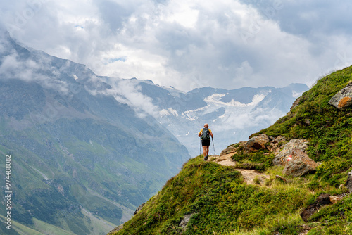 person on top of mountain