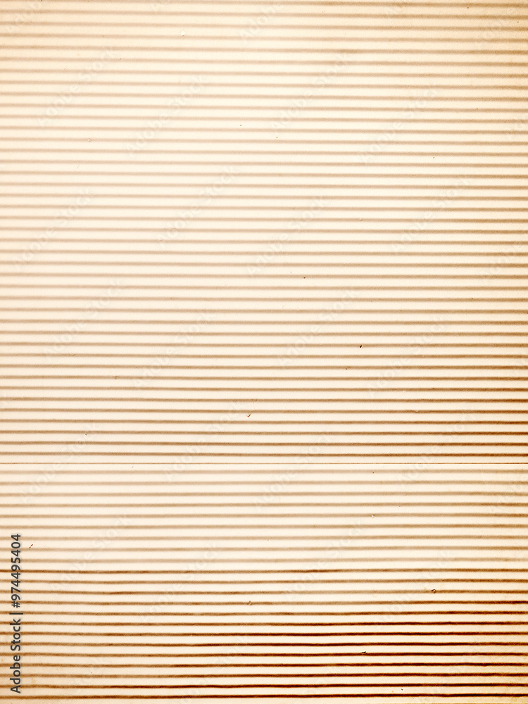 Beige cardboard background with horizontal stripes and small stains, vintage paper texture for design or print. Beige cardboard background with horizontal stripes and small stains, vintage paper texture for design or print.
