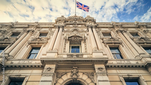 The facade of a historic government building with traditional architecture, ornate details, and a large flagpole displaying the national flag