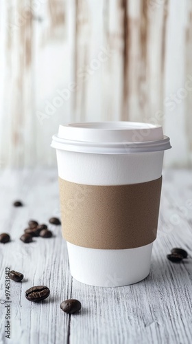 Minimalist coffee cup mockup with blank sleeve. Wood background and coffee beans. Ready for branding