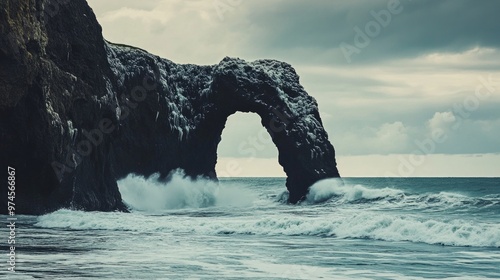 Majestic Ocean Arch, a stunning natural formation rising from the sea, shaped by relentless waves, showcasing the power of nature in a breathtaking coastal landscape. photo