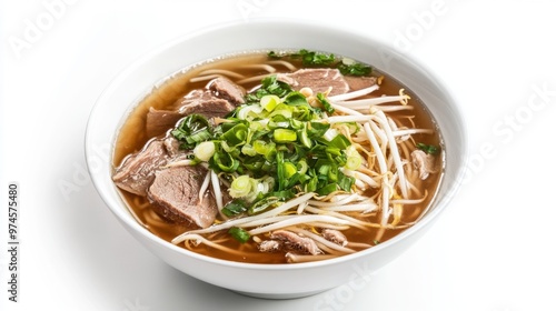 A dynamic shot of a bowl of noodle soup with clear broth, garnished with green onions, bean sprouts, and slices of meat, placed on a white background.