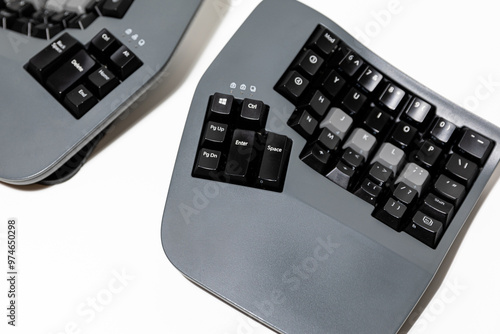 Ergonomic grey black split keyboard mechanic on an isolated background