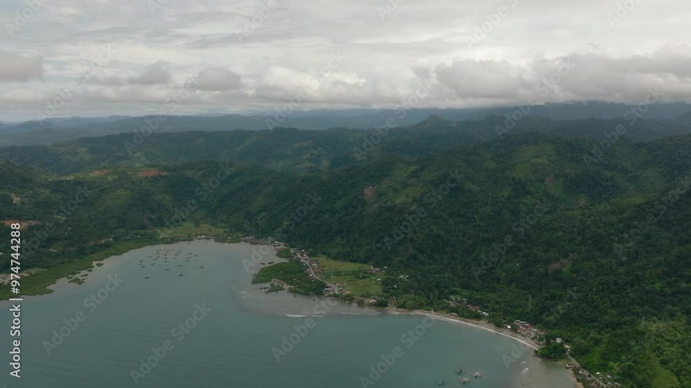 A bay and a coast with a rainforest. Sumatra, Indonesia. A bay and a coast with a rainforest. Sumatra, Indonesia.