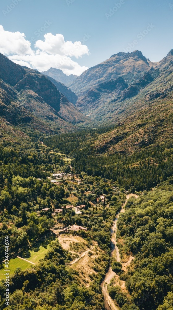 Fototapeta premium Terrain – Bird’s-Eye View of Diverse Terrain Featuring Mountains, Rivers, and Arid Land
