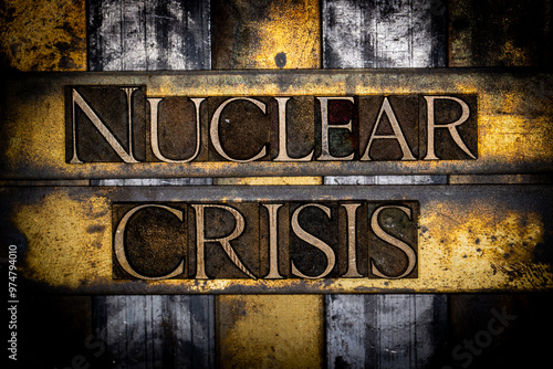 Nuclear Crisis text in real authentic typeset letters on vintage textured silver grunge copper and gold background