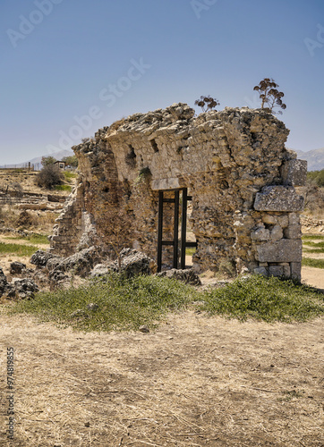 Landscape with ruins of Ancient Roman city Aptera on the island of Crete in Greece