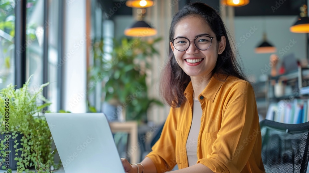A person typing away on their computer