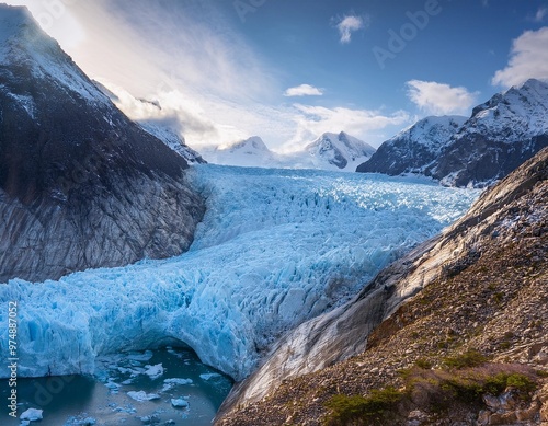 Icy Glaciers Carving Through Majestic Mountains, Showcasing Nature's Power photo