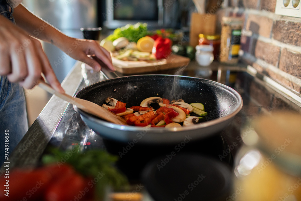 Young woman preparing fresh vegetables in a modern kitchen Young woman preparing fresh vegetables in a modern kitchen