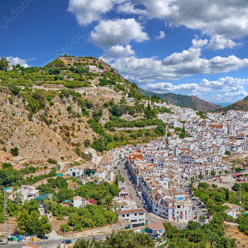 Panoramic, view and mountain with architecture, skyline and coastal town in Spain with houses and hill. Development, holiday and vacation destination in Europe with village and travel on trip