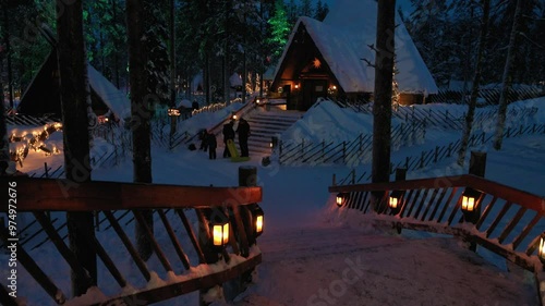 As snowflakes gently fall, a quaint village comes alive with warm lights. Friends gather by cozy cabins, sharing joy and creating magical memories under the starry sky.	 photo