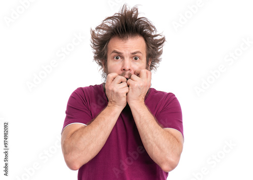 A frightened man with wild, messy hair, holding his hands near his face in a nervous gesture. Isolated on a white background.