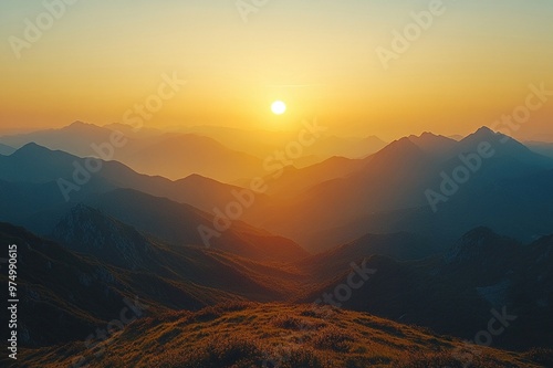 Hazy silhouette of mountains against a sunset