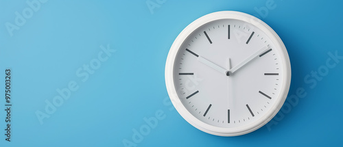 Wallpaper Mural A simple white wall clock against a blue background. Perfect for projects related to time, productivity, or minimalism. Torontodigital.ca