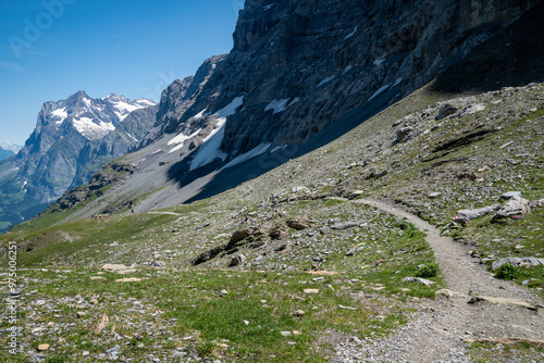 Eiger trail, hiking near the famous mountain of the Bernese Swiss Alps - North Face of the Eiger mountain photo