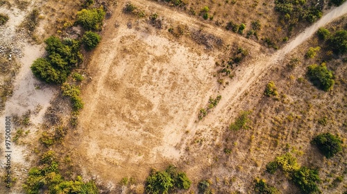 An aerial view of a land plot, highlighting a registration symbol for a vacant area, connected to property, real estate, and business concepts such as development, sale, rent, and investment