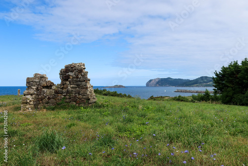 Ruins of Ermita del Crucifijo Overlooking the Ocean in Bermeo, Basque Country photo