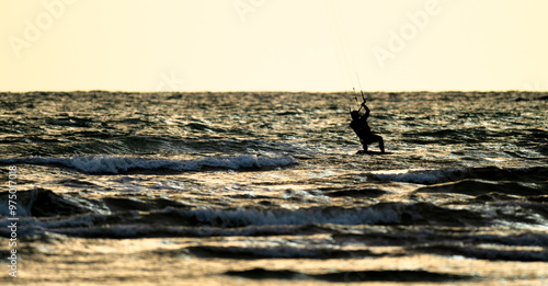 Photography Kite surfing in a windy evening.