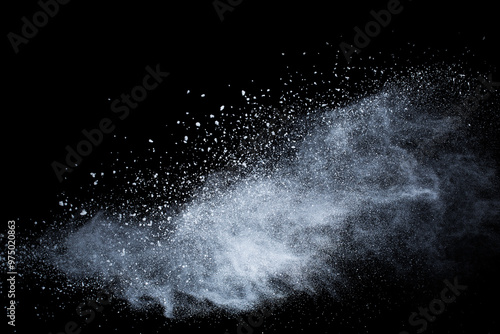 White powder explosion on black background. Colored cloud. Colorful dust explode. Paint Holi.