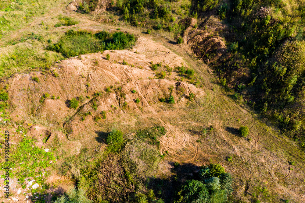Aerial view of overgrown sand quarry after mining Aerial view of overgrown sand quarry after mining