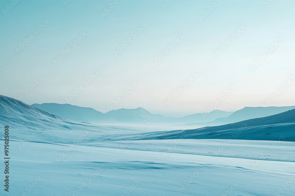A serene snow-covered landscape with a gradient sky transitioning from a pale blue at the horizon to a deep indigo above. The snow-covered ground and distant mountains are bathed in the cool gradient