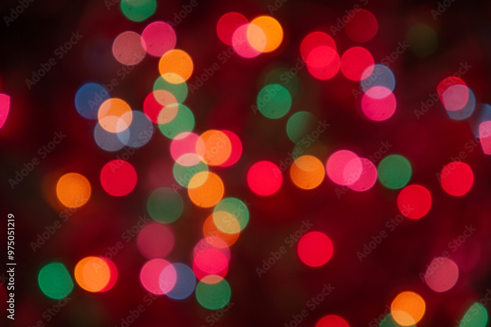 Obraz premium Christmas colorful bokeh lights. Photography taken on a christmas tree. Blurred circle shapes background photography