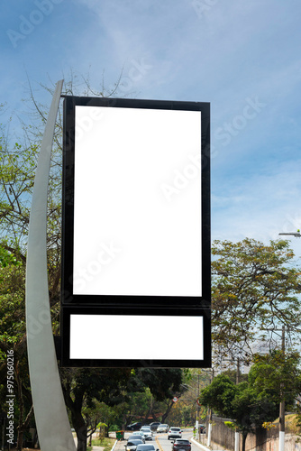 Digital street clock on an avenue in São Paulo, photograph with copy space, street furniture.