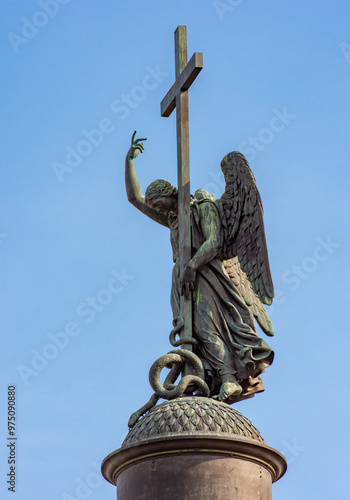 Angel statue holding cross on top of Alexander column in Palace square, Saint Petersburg, Russia