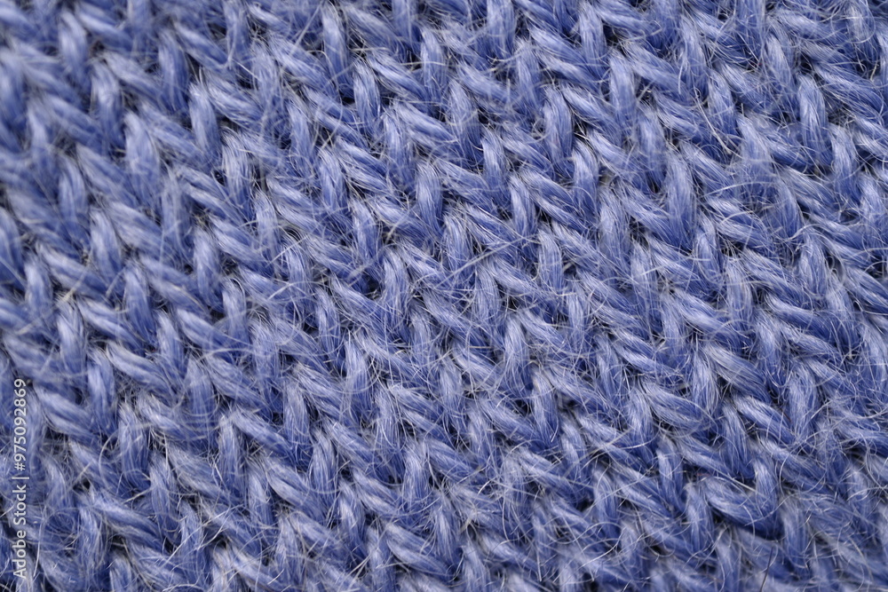 macro texture of purple crocheted sweater as a background, close-up of purple crocheted front surface, woolen texture of alpaca wool crocheted macro texture of purple crocheted sweater as a background, close-up of purple crocheted front surface, woolen texture of alpaca wool crocheted