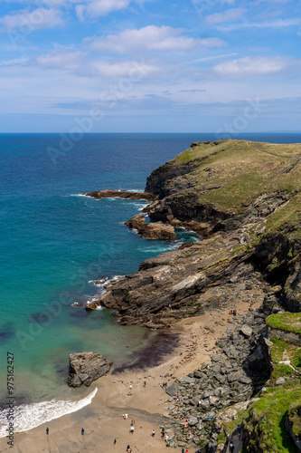 View from Tintagel Castle: Cliffs, Beach, and Sea with Blue Water and Golden Sand