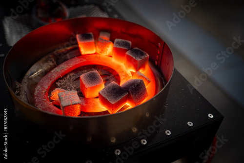 Heating coals for hookah. P...