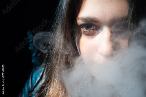 Woman smoker. Girl blows ou...