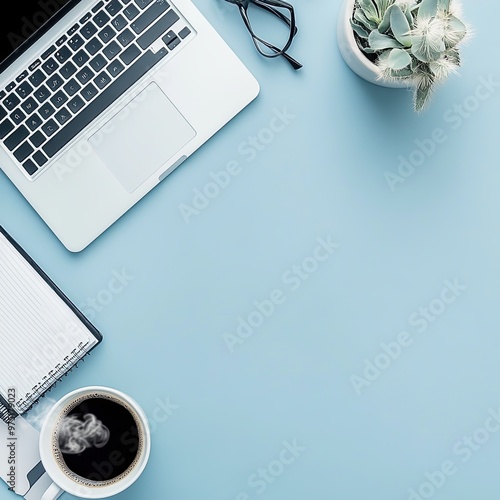 Modern Workspace with Laptop, Coffee, and Plants