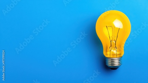 Yellow Light Bulb on Blue Background  Inspiration  Idea  Creativity  Innovation