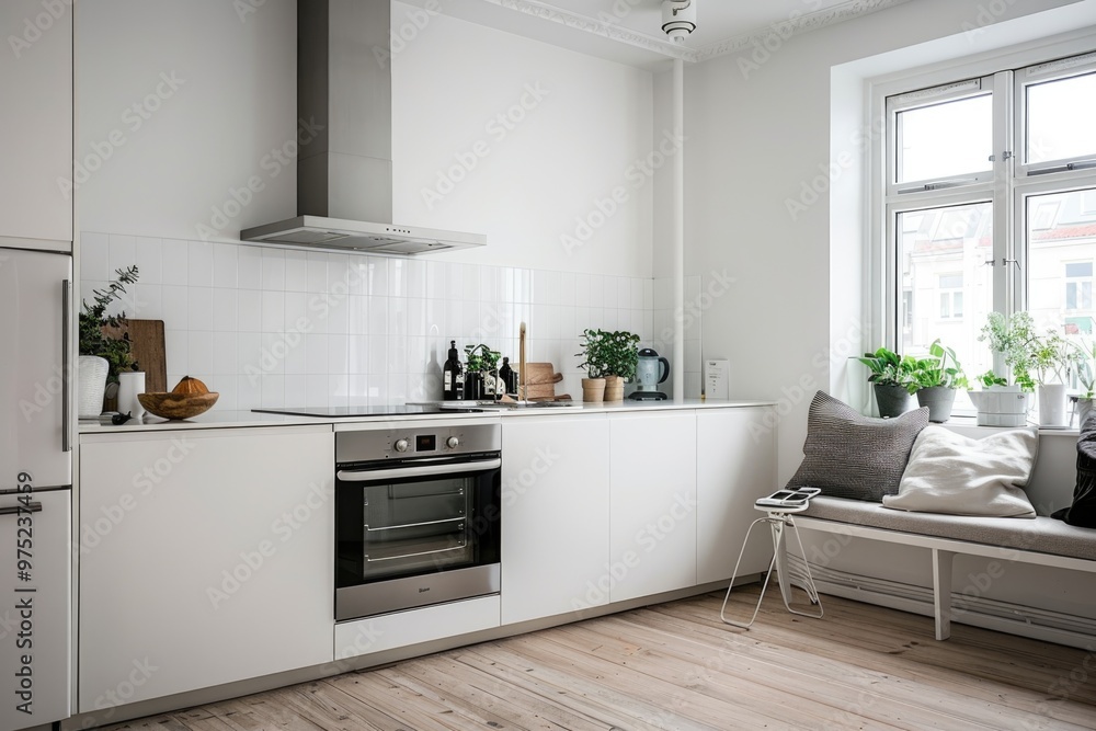 Minimalist white kitchen with cozy seating area and stylish appliances Minimalist white kitchen with cozy seating area and stylish appliances
