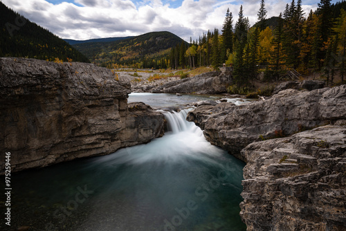 waterfall in the mountains photo