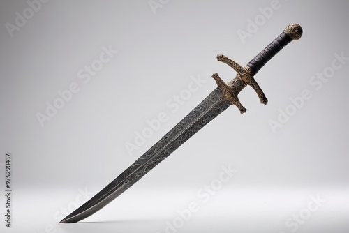 a sword with a gold handle and a black handle 