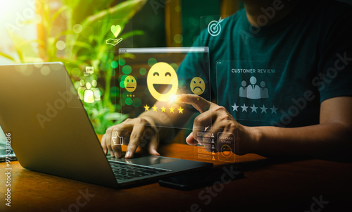 User Typing on Laptop to Submit Customer Feedback with Digital Satisfaction Ratings, Featuring Virtual Icons for Positive Review, Customer Service, and Online Consumer Interaction in Business Platform photo