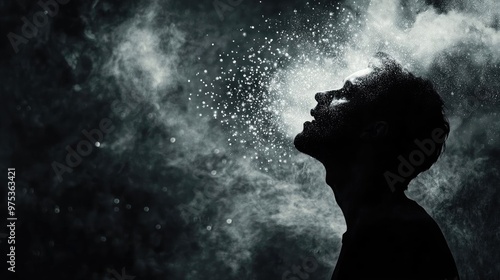 A silhouette of a man releasing mist, conveying a sense of freedom and exploration in a dark, artistic atmosphere.