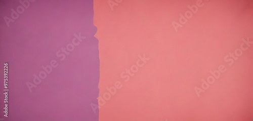 a close-up of a wall with a vertical strip of pink paint on the right side, and a solid purple wall on the left side.
