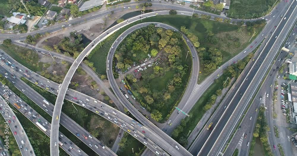Aerial view city transport junction cross road with green tree park transport industry Aerial view city transport junction cross road with green tree park transport industry