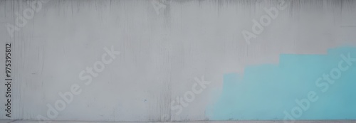 A concrete wall with a blue paint stroke on the right side, creating a gradient effect.